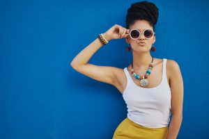 Shot of an attractive young woman wearing funky sunglasses against a blue backgroundhttp://195.154.178.81/DATA/i_collage/pi/shoots/806374.jpg